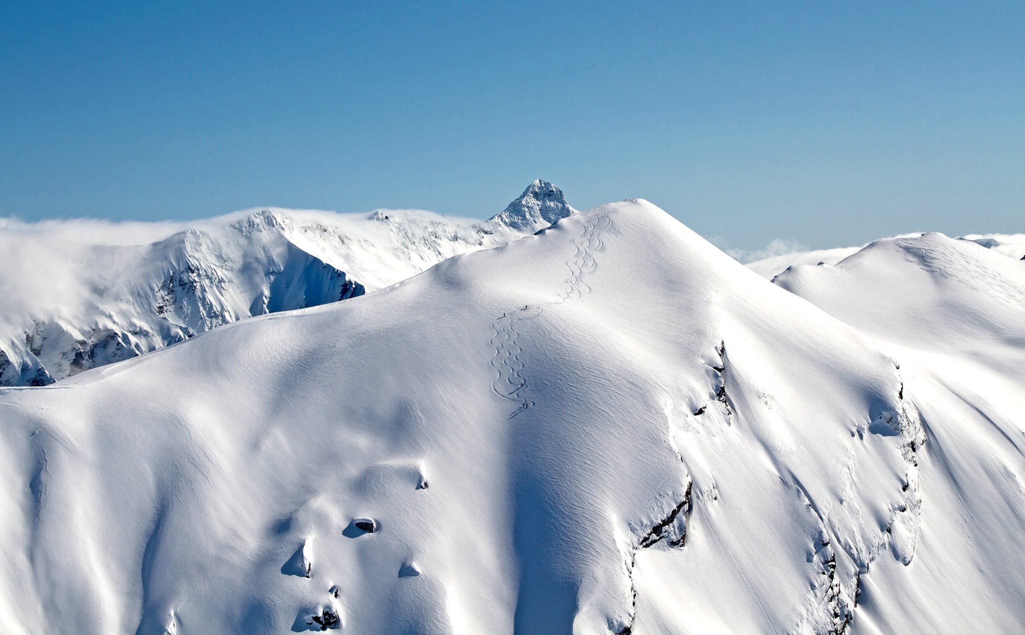 Go heliskiing on the highest peaks without crowds.