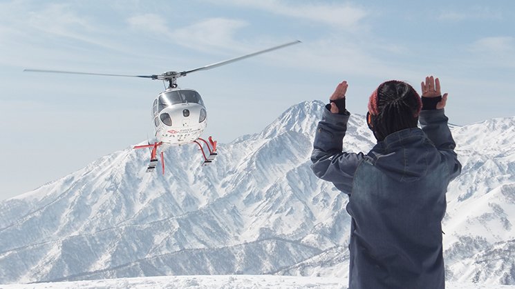 Heliskiing in Japan's deep poweder