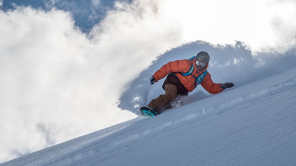 fresh powder spray snowboarding